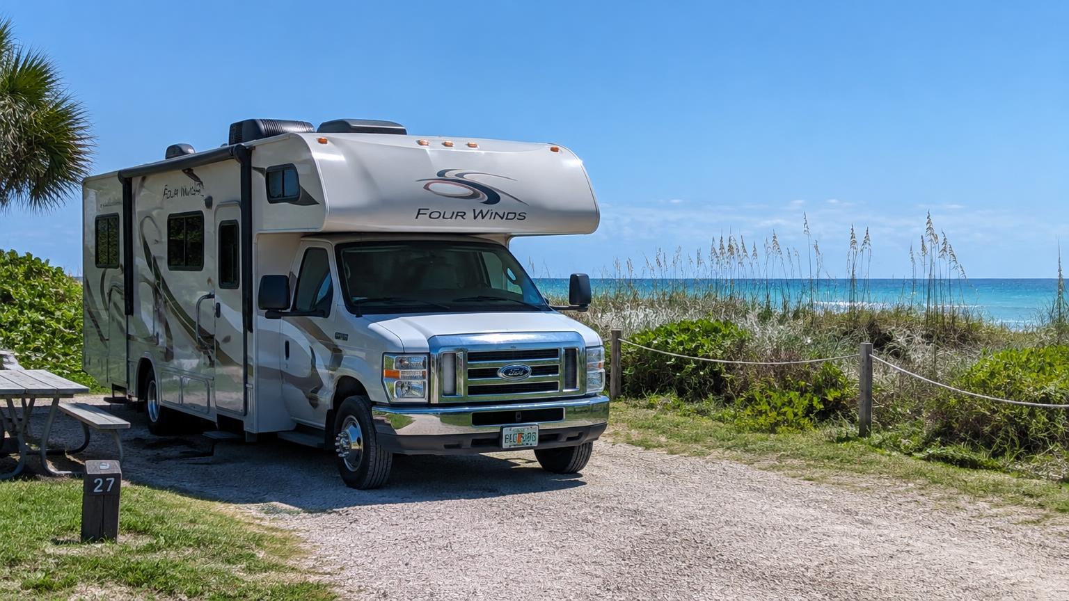Class C motorhome at a campsite near the Gulf beach dunes in Venice, Florida